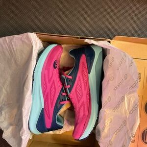 Vibrant Pink and Blue Athletic Shoes for Performance